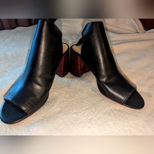 Black square heeled, open toe booties Ni e West